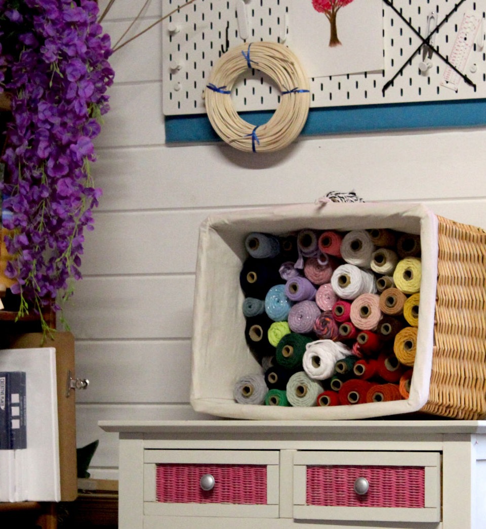 Basket filled with colourful macrame cord